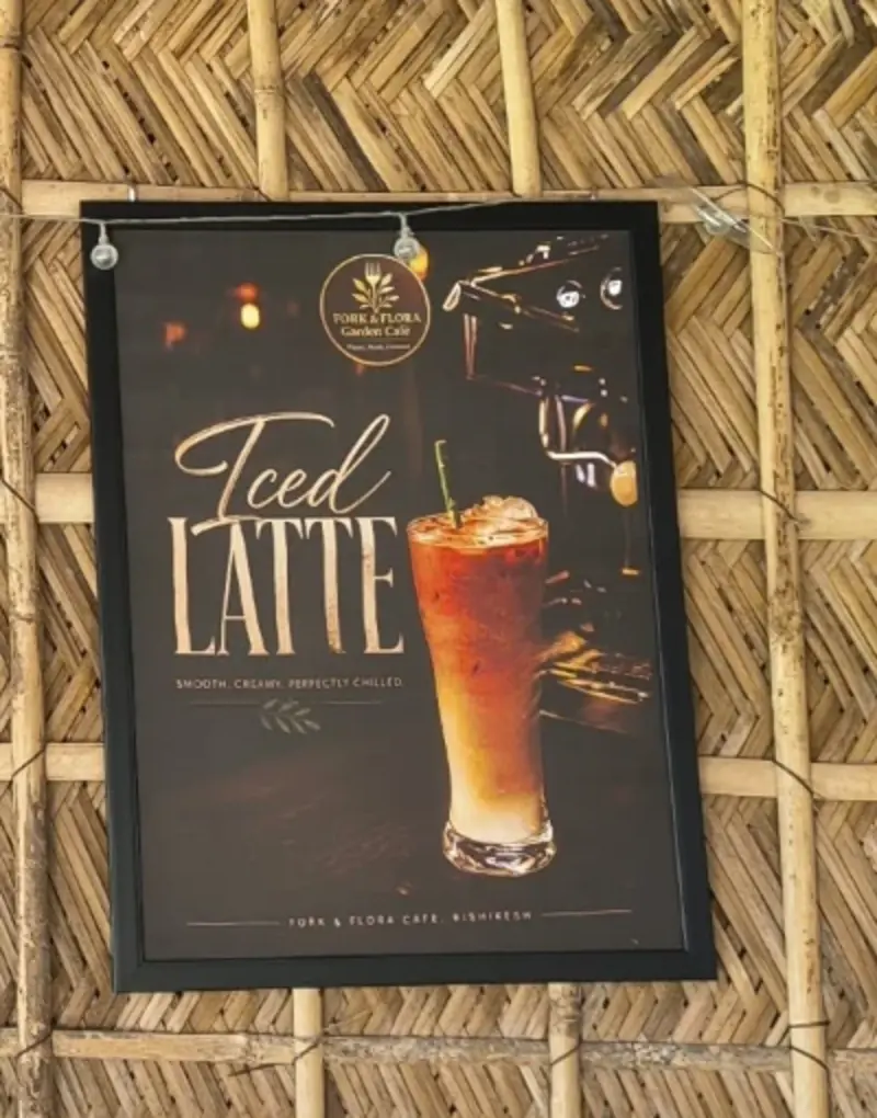 Fork & Flora's iced latte poster photographed at the café